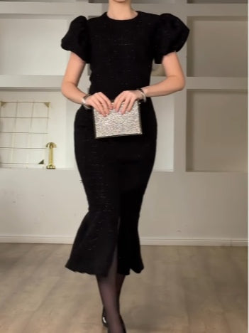 Elegant black Chanel-style puff sleeve midi dress