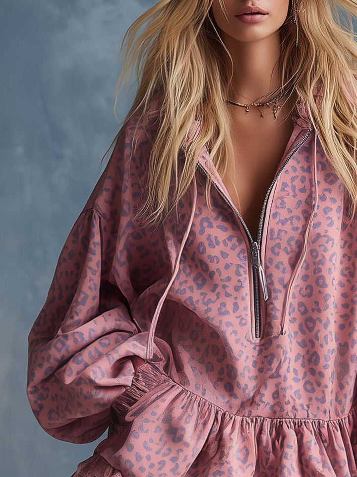 Pink leopard print hooded mini dress with front zipper and ruffled hem