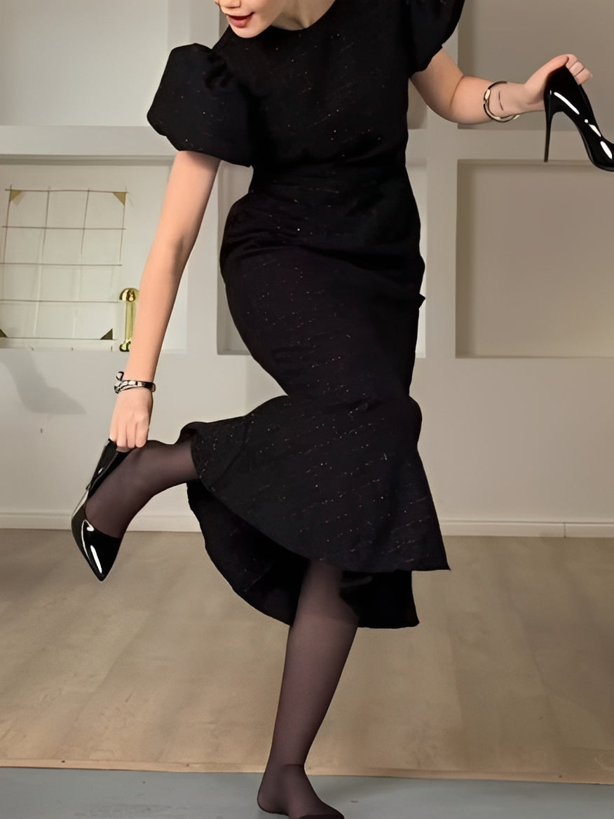 Elegant black Chanel-style puff sleeve midi dress