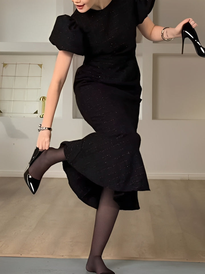 Elegant black Chanel-style puff sleeve midi dress